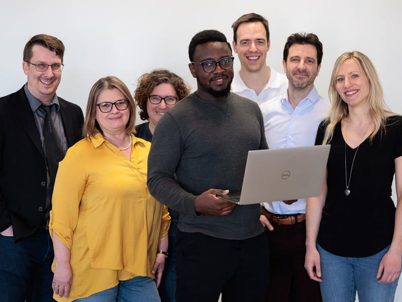 Portrait-of-business-team-posing-in-office